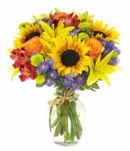 Bouquet of flowers with sunflowers, lilies and more.