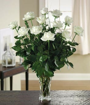 Luxury White Roses Bouquet: One dozen long-stemmed white roses arranged in a Lenox® crystal ribbon vase, perfect for any special occasion.